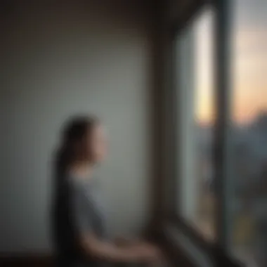 Isolation and Its Mental Toll A solitary figure gazing out a window, representing isolation during lockdown.