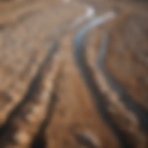 Aerial view of a dried riverbed highlighting the effects of climate change on water supply